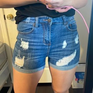 High waisted denim shorts with distressing